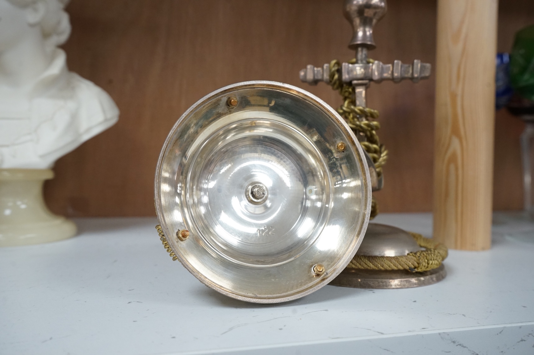 A pair of silver plated and part gilded anchor candlesticks, 18cm high.